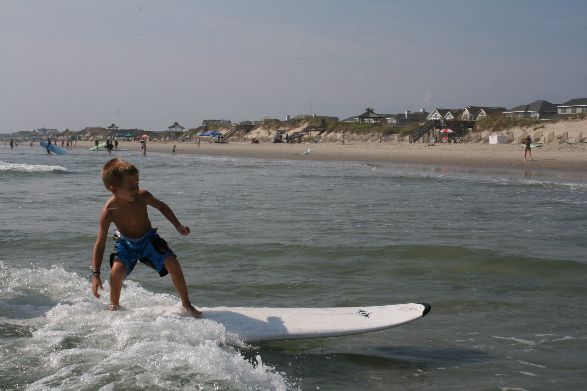 boy surfing corolla